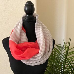 Pink, grey infinity scarf with pastel striped print,